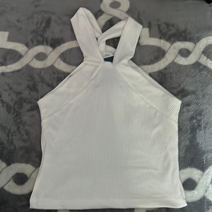 Cute white tank. Can be worn two different ways. Comfy material.